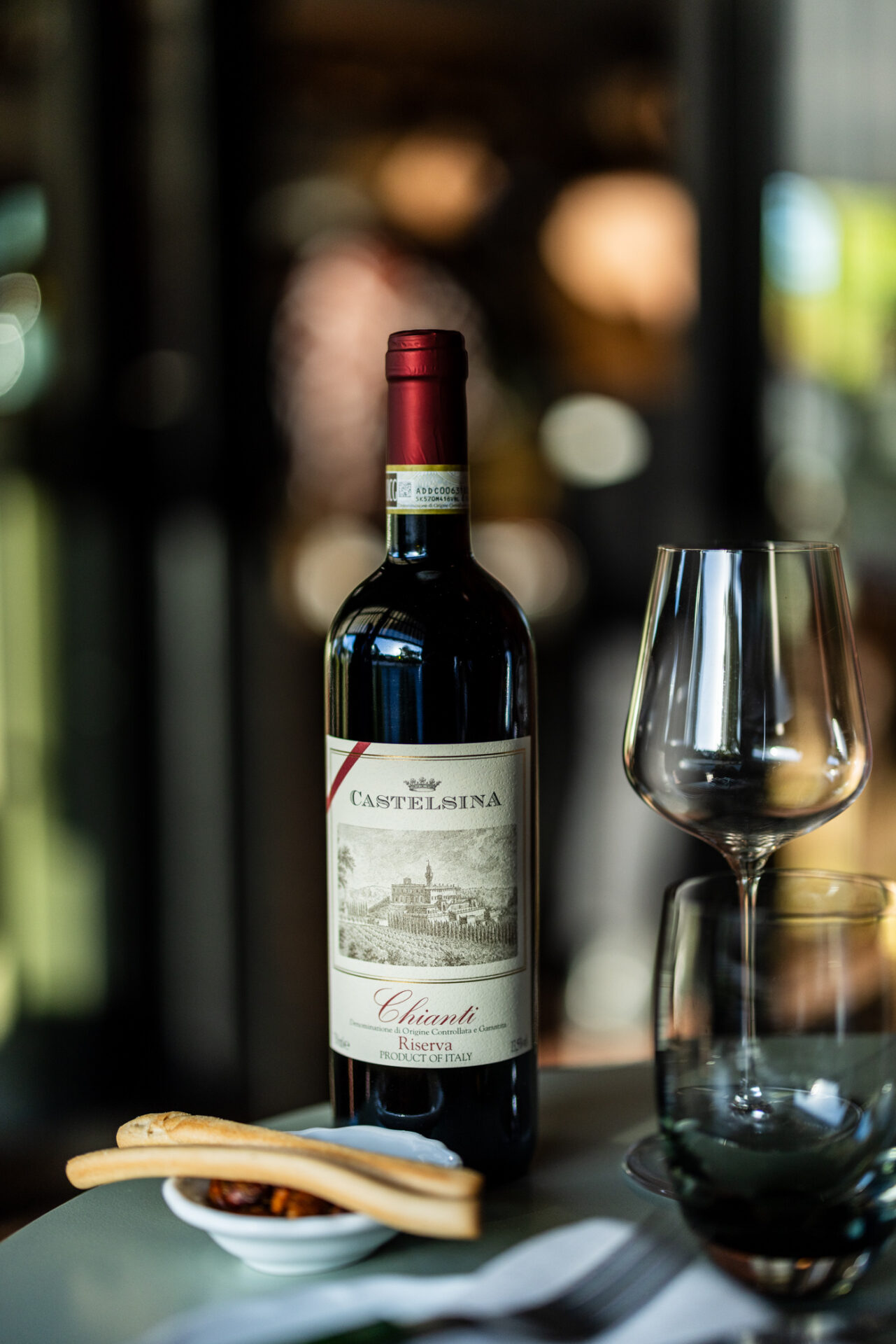 Bottle of Chianti with wine glass at Bar Vino in Mount Lawley