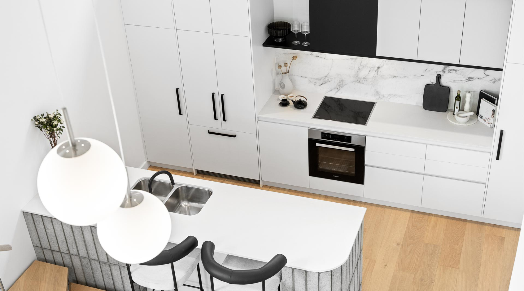 Elevated view of a kitchen and breakfast bar at Clifton & Central - Mt Lawley