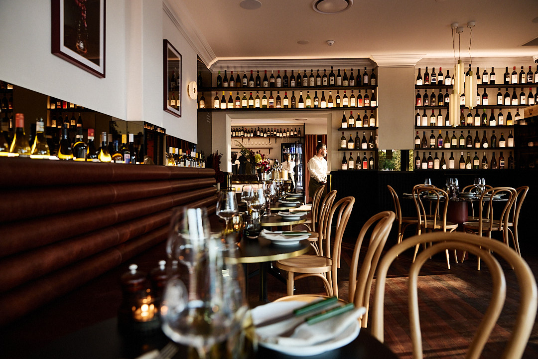 Looking over the interior of Bar Vino in Mount Lawley Towards a waiter ready for service